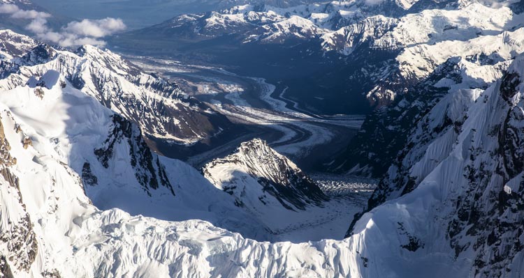 An aerial view towards a glacial flow.