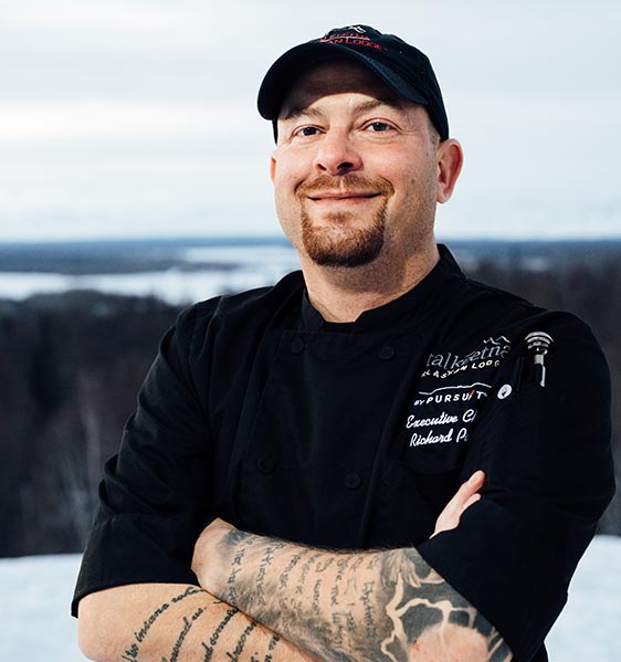 Chef Tim Barath stands in front of restaurant