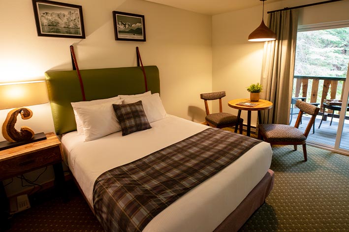 A bed in a hotel room