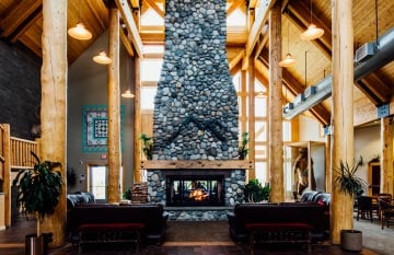 Towering River Rock Fireplace