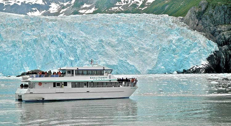 Kenai Fjords Tours Boat alongside the Aialik Glacier
