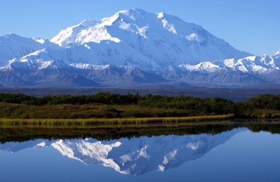 View of Denali mountain reflecting in Wonder Lake