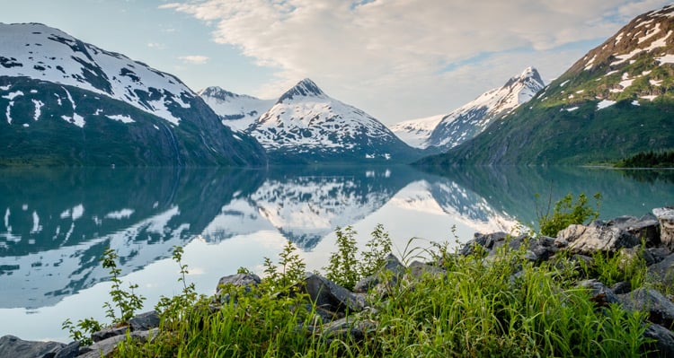A stunning view of mountains and a lake in Kenai Fjords