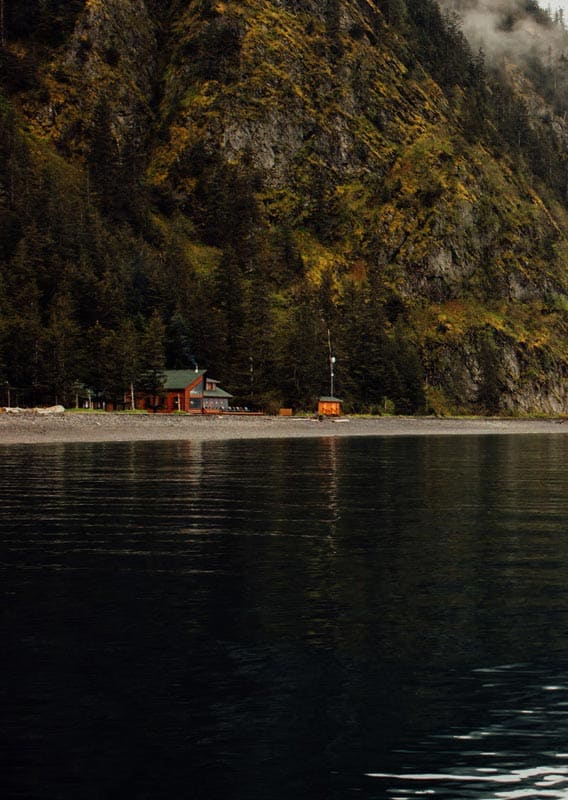 A view of Kenai Fjords Wilderness Lodge from the water.