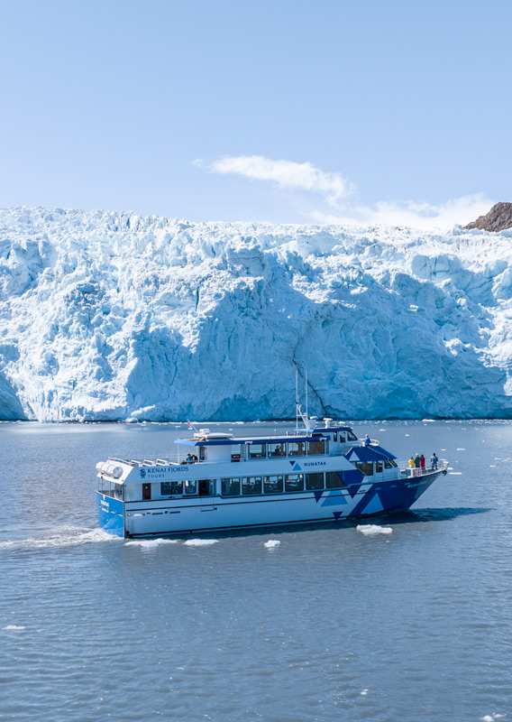 Kenai Fjords Tour boat sailing beside Holgate Glacier