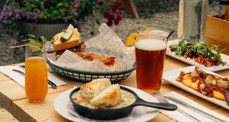 Dishes served on an outdoor patio table at Homestead Kitchen in Alaska