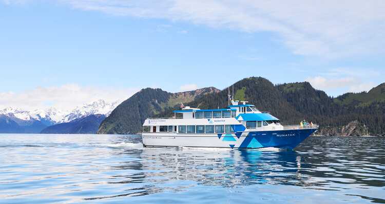 A boat cruising on the calm sea.